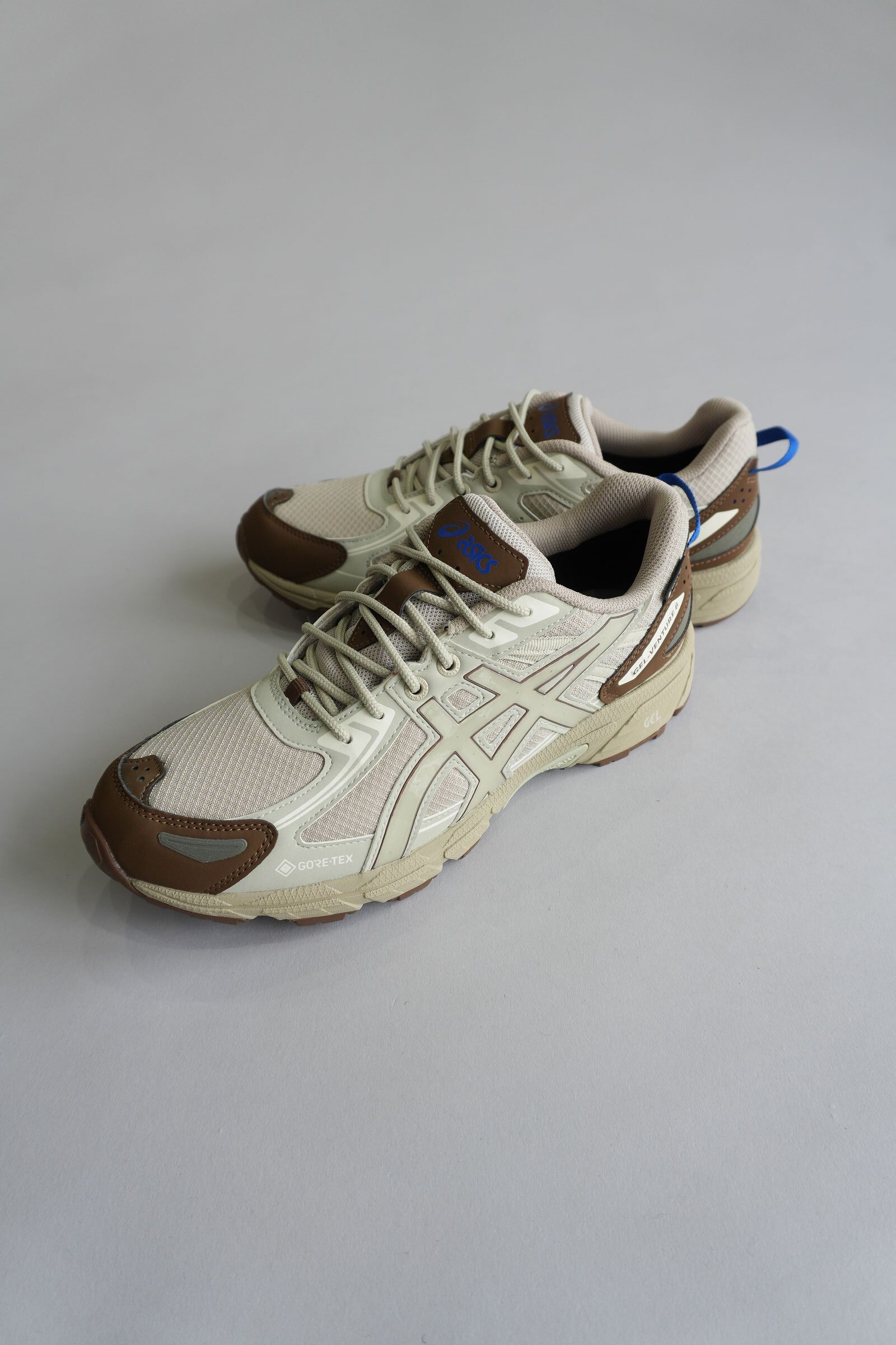1203A560-Fossil/Cream